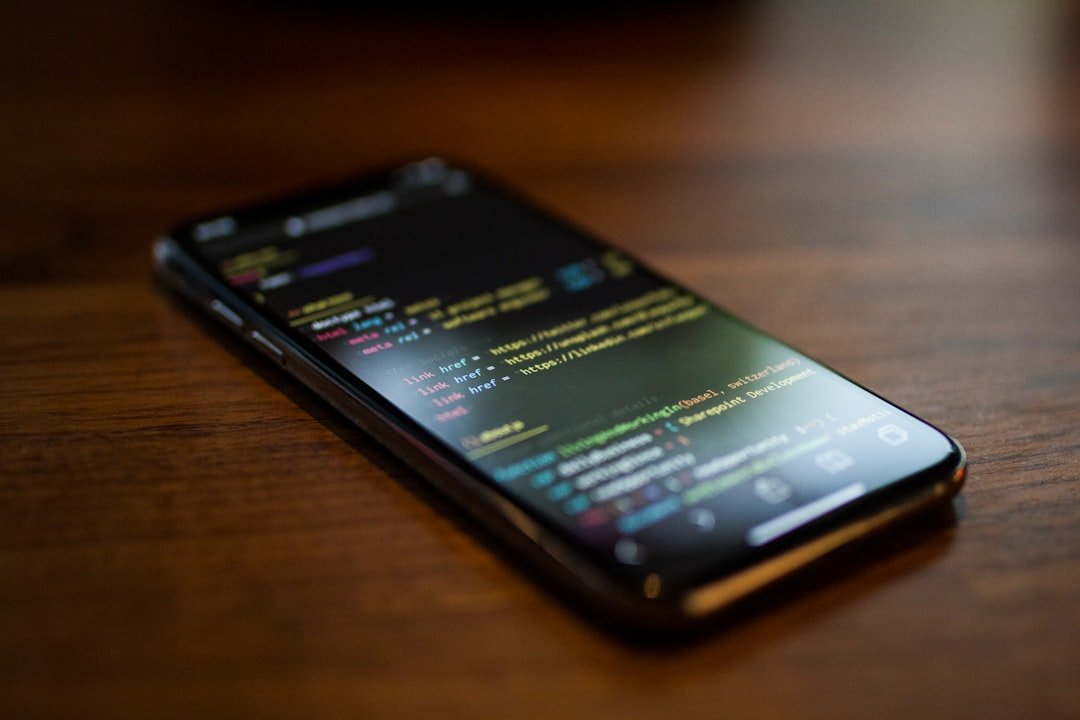 Turned-on black Android smartphone displaying a mobile app interface on a dark background
